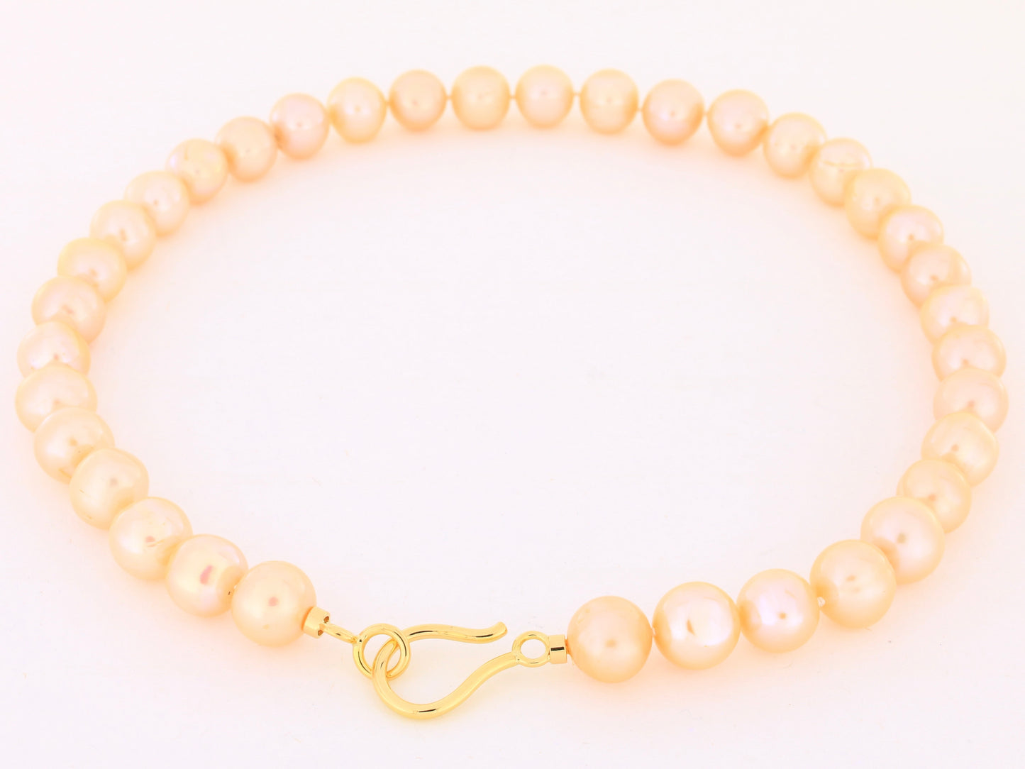 Perlenkette „Peachcolor“ mit 18kt Gelbgold