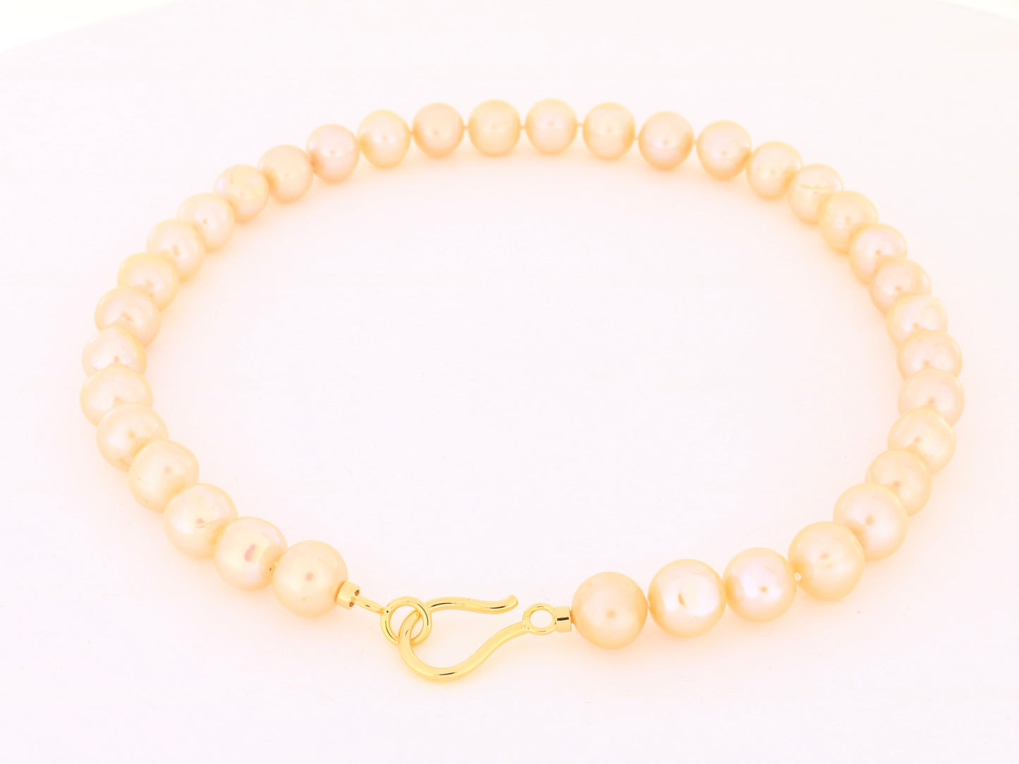 Perlenkette „Peachcolor“ mit 18kt Gelbgold