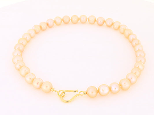 Perlenkette „Peachcolor“ mit 18kt Gelbgold