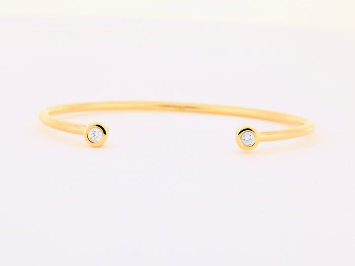 Armspange aus 18kt Gelbgold mit zwei Brillanten
