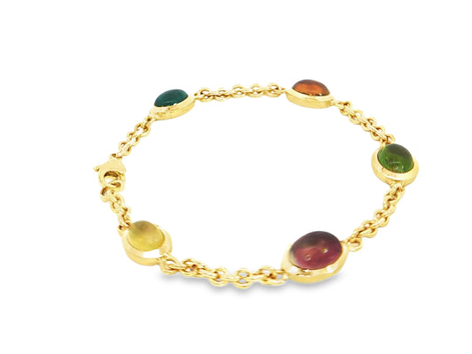 Turmaline Harmonie“ – Armband aus 18kt Gelbgold mit 5 Cabochon-Turmalinen
