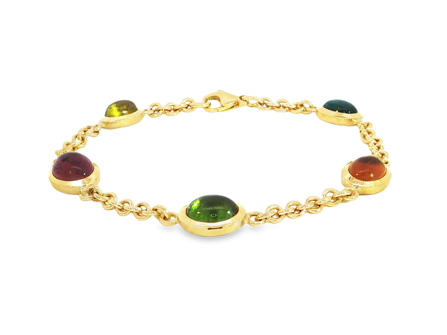 Turmaline Harmonie“ – Armband aus 18kt Gelbgold mit 5 Cabochon-Turmalinen