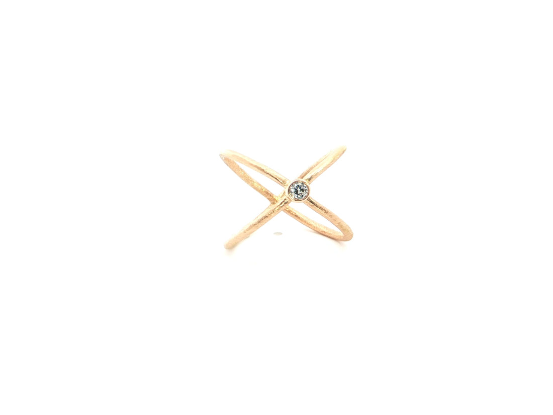 X-Ring aus 18kt Rotgold mit Brillant